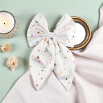 Load image into Gallery viewer, White Satin Hair Bow Clip with Confetti Print Set of 1