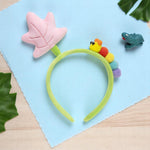 Load image into Gallery viewer, Plush Kids Hairband with Rainbow Caterpillar & Pink Flower Design