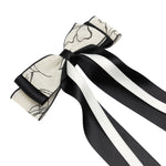 Load image into Gallery viewer, Elegant Black & White Hair Bows – Floral Print Ribbon Clips for Girls & Women