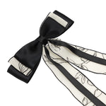 Load image into Gallery viewer, Elegant Black & White Hair Bows – Floral Print Ribbon Clips for Girls & Women