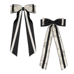 Load image into Gallery viewer, Elegant Black &amp; White Hair Bows – Floral Print Ribbon Clips for Girls &amp; Women