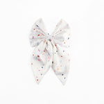 Load image into Gallery viewer, White Satin Hair Bow Clip with Confetti Print Set of 1
